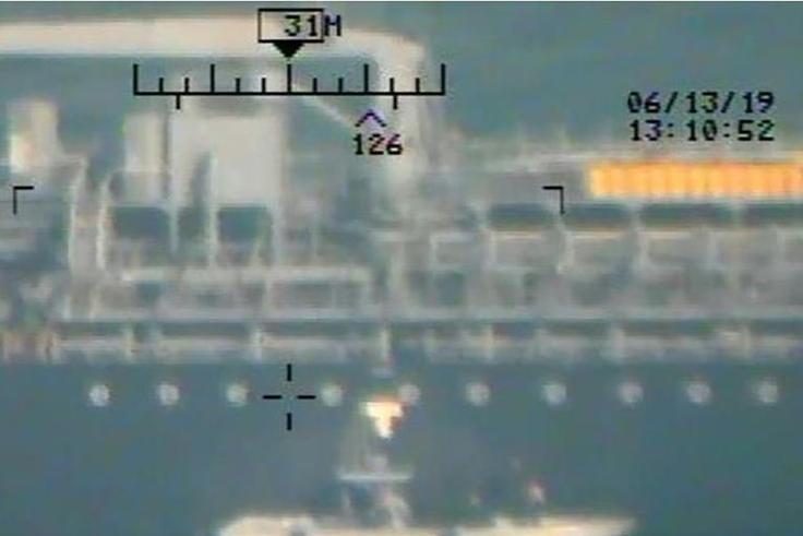 This image released on June 17, 2019 by the US Department of Defense is presented as new evidence incriminating Iran in the June 13 tanker attacks in the Gulf of Oman