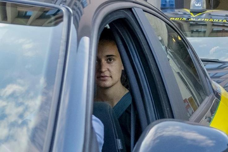 Carola Rackete, the German captain of the humanitarian rescue ship Sea-Watch 3, leaves the Italian Guardia di Finanza law enforcement agency on July 1