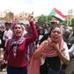 Sudanese protesters march in the capital's Bahri district to denounce the Al-Obeid killings