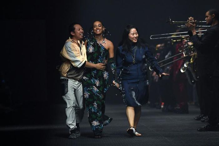 Final fanfare: US singer Solange Knowles with Kenzo's designers Humberto Leon and Carol Lim at the end their Paris fashion show