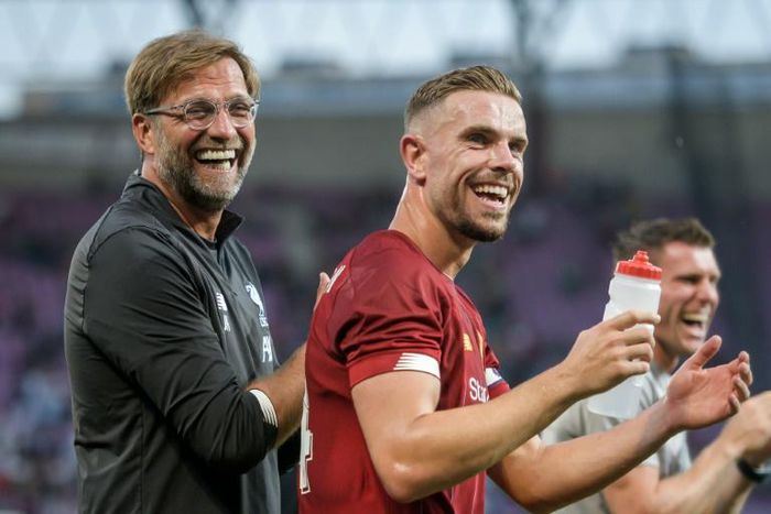 Jordan Henderson says Liverpool manager Jurgen Klopp (left) 'knows better than everyone else' about signings