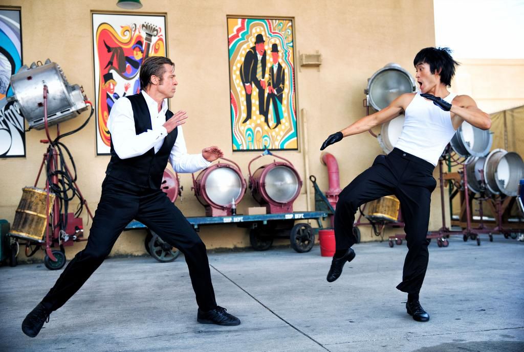 Mike Moh, as Bruce Lee, fighting with Brad Pitt in Once Upon a Time ... in Hollywood.