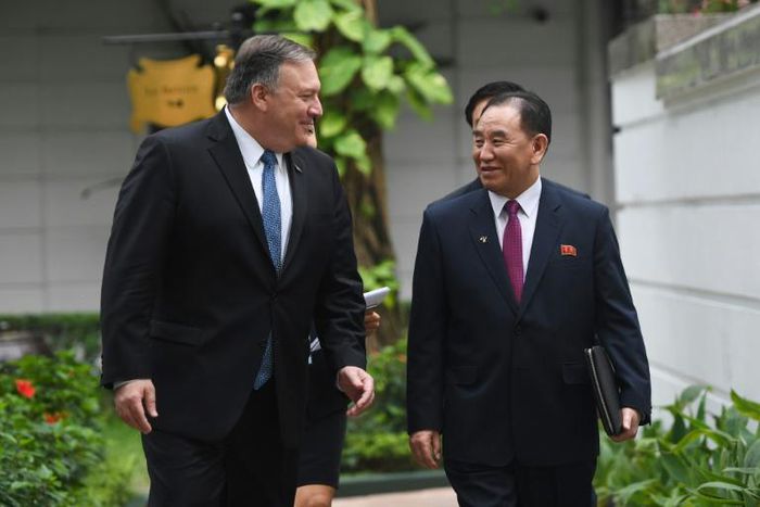 US Secretary of State Mike Pompeo (L) speaks with North Korean senior ruling party official Kim Yong Chol during the second US-North Korea summit at the Sofitel Legend Metropole hotel in Hanoi on February 28, 2019