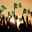 Nigerian citizens holding the Nigerian flags (Lionesses of Africa)