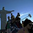 Tourists take selfies by the Christ the Redeemer statue in Rio de Janeiro -- one of many must-have selfie spots in the Brazilian city