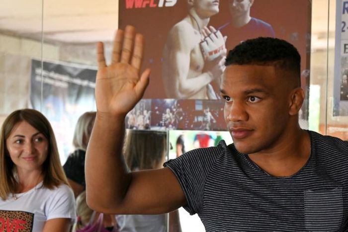 Zhan Beleniuk, an Olympic wrestler with Rwandan roots, is running to become the first mixed-race member of Ukraine's parliament