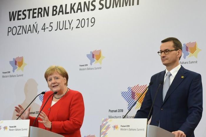 German Chancellor Angela Merkel and Polish Prime Minister Mateusz Morawiecki speaking after the Western Balkans Summit