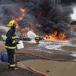 Firefighters battle to put out a fire resulting from a pipeline explosion in Ijegun, Lagos on Thursday, July 4, 2019 [Twitter@MobilePunch]