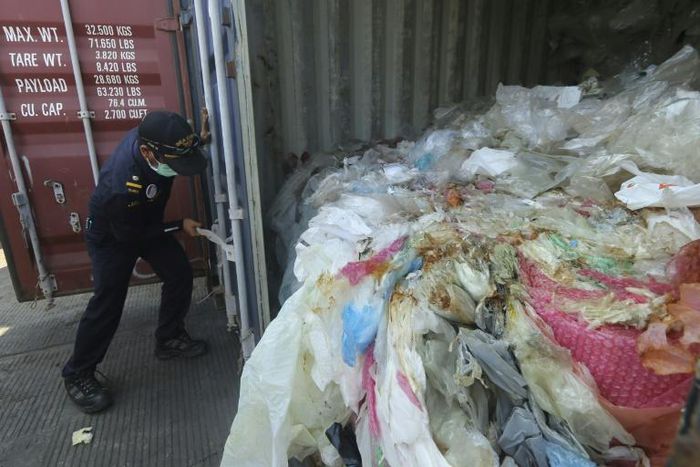 The containers were loaded with a combination of garbage, plastic waste and hazardous materials in violation of import rules, according to customs officials