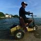 A disabled diver watches the sea in Puerto Lempira, Honduras: thousands of lobster divers end up disabled from a lack of proper equipment or medical follow-up for decompression sickeness