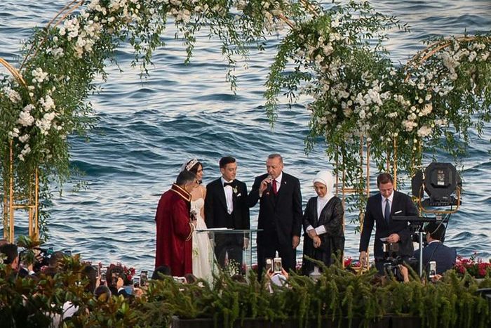 Mesut Ozil and his bride Amine Gulse stood next to Turkish President Recep Tayyip Erdogan and his wife Emine Erdogan during the wedding ceremony in Istanbul