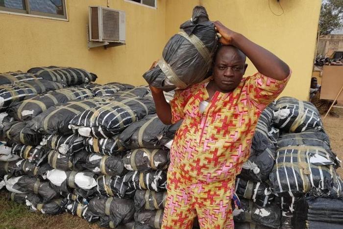 An indian hemp merchant suspect, who was reportedly caught with 114 bags of the illegal substance/Illustration [Premiumtimesng]