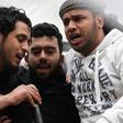 Abdel-Basset al-Sarout (L), a Syrian goalkeeper turned rebel fighter, was a popular singer of protest songs from the central city of Homs who starred in an award-winning documentary about his country's war