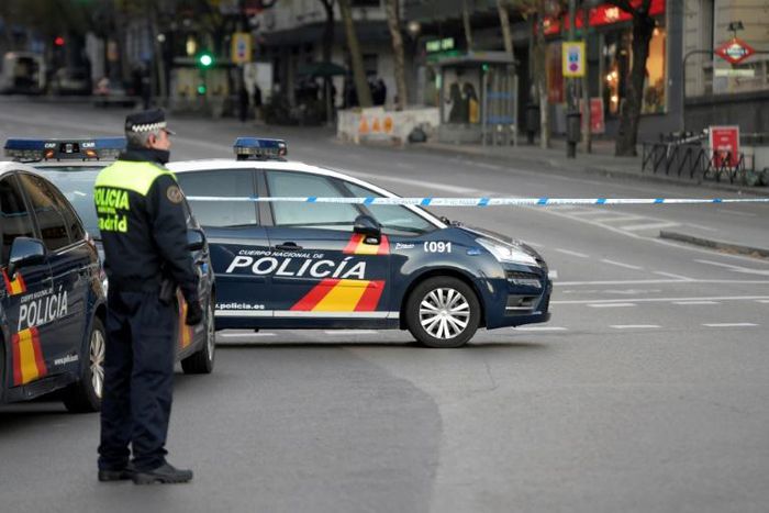 Police in Madrid, like these pictured in 2014, were part of a collaboration with Europol to search 14 homes and premises