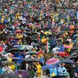 Tens of thousands gathered in the rain for a mass by Pope Francis on his second day in Romania with the ceremony in a predominantly ethnic-Hungarian part of the picturesque Transylvania region