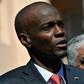 Several thousand people marched on June 9, 2019 through the streets of Port-au-Prince to demand the resignation of President Jovenel Moise (L) over his alleged role in an embezzlement scheme