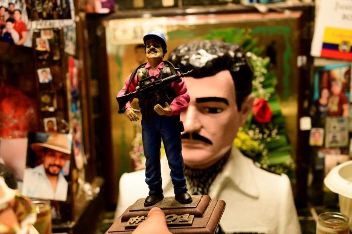 A figurine of Mexican drug lord Joaquin "El Chapo" Guzman, who is feared and revered in equal measure in Mexico's Sinaloa region