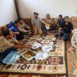Fighters loyal to Libya's internationally-recognised Government of National Accord (GNA) prepare an Iftar meal south of Tripoli