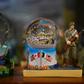 Snow globes commemorating the June 1944 Normandy landings at a souvenir shop in Saint-Côme-du-Mont, France