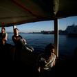 "It would be desirable if... an agreement is reached so that seven or eight countries coordinate to distribute the people," said Proactiva Open Arms founder Oscar Camps. Crew members are shown aboard the ship on World Refugee Day in June