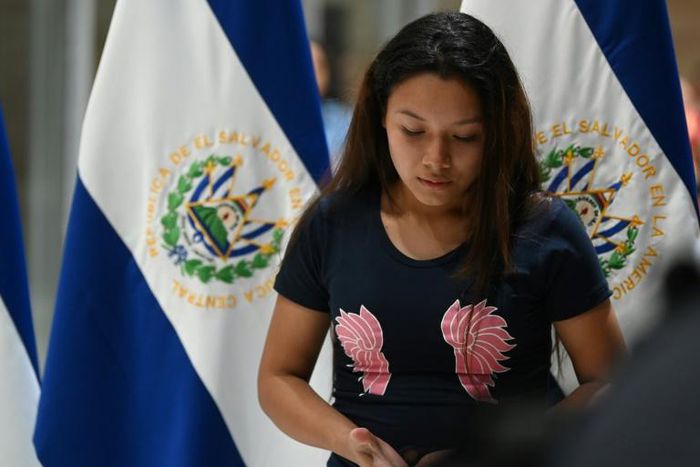 Tania Avalos arrives at the international airport in San Salvador on June 28, 2019