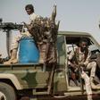 Members of the Rapid Support Forces secure a rally for supporters of Sudan's ruling Transitional Military Council in the village of Abraq, about 60 kilometers northwest of Khartoum, last month