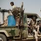 Members of the Rapid Support Forces secure a rally for supporters of Sudan's ruling Transitional Military Council in the village of Abraq, about 60 kilometers northwest of Khartoum, last month