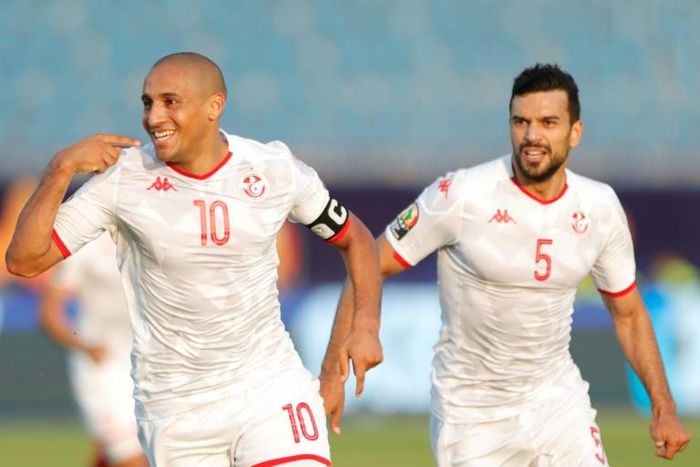 Tunisia's forward Wahbi Khazri (L) celebrates his goal with teammates during the 2019 Africa Cup of Nations (CAN) Group E football match between Tunisia and Mali at the Suez Stadium on June 28, 2019.