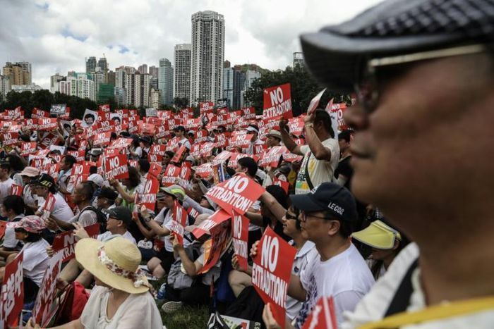 The protesters are calling on the Hong Kong government to scrap a planned law that would for the first time allow extradition to mainland China