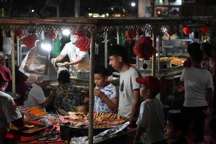 From the expansive dunes of the Taklamakan Desert to the snow-capped peaks of Tianshan, Chinese authorities are selling troubled Xinjiang as a tourist idyll, welcoming travellers even as they send locals to internment camps