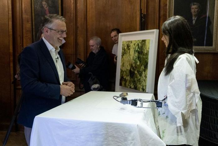Gallery owner Aidan Meller (L) is selling works by robot artist Ai-Da