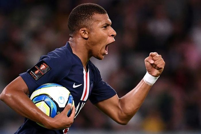 Paris Saint-Germain forward Kylian Mbappe celebrates scoring during the French Trophy of Champions match against Rennes