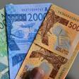 Some economists urge West Africa to hold on to national currencies