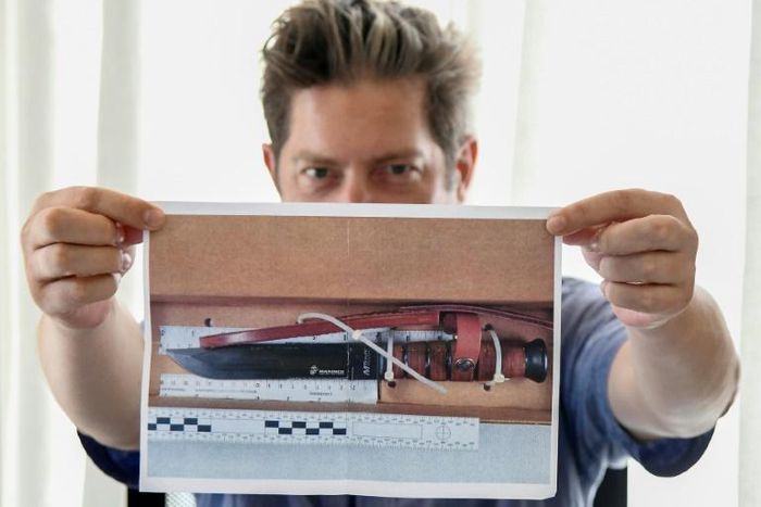 A printed picture of the knife used in the murder of Carabinieri's officer Mario Cerciello Rega. The father of suspect Gabriel Natale Hjorth says his son didn't know his friend who police say has confessed to the stabbing was armed