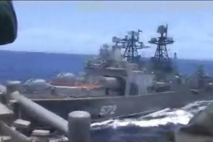 Photos posted online by the US Navy showed that the wake of the US ship is straight with little movement, while that of the Admiral Vinogradov is curved -- showing that it changed direction to align itself with the USS Chancellorsville