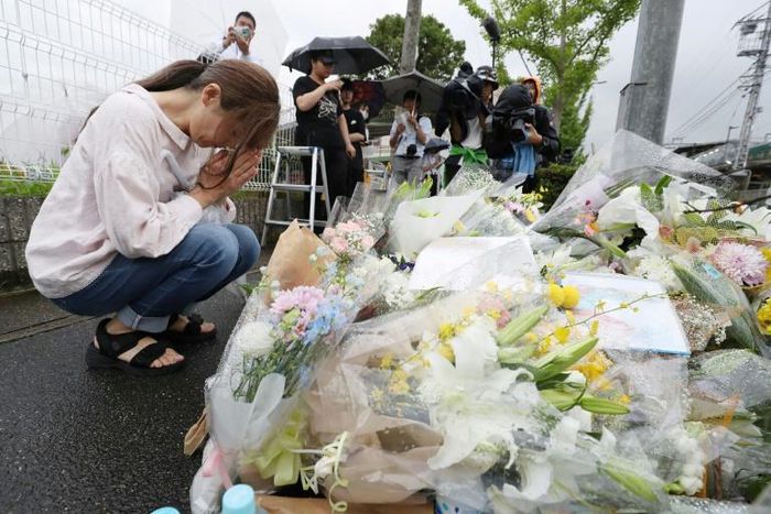 People continued to pay tribute to the victims on Saturday, leaving flowers