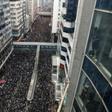 Thousands of protesters dressed in black rallied against Hong Kong's government