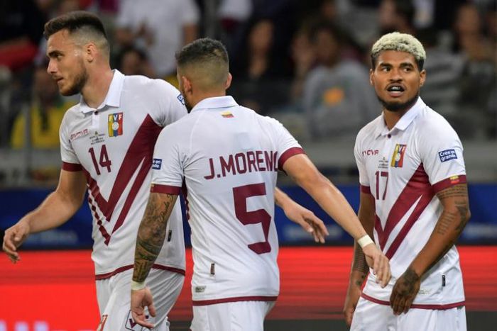 Josef Martinez (right) celebrates his goal against Bolivia that ensured Venezuela would progress to the Copa America knock-out stages