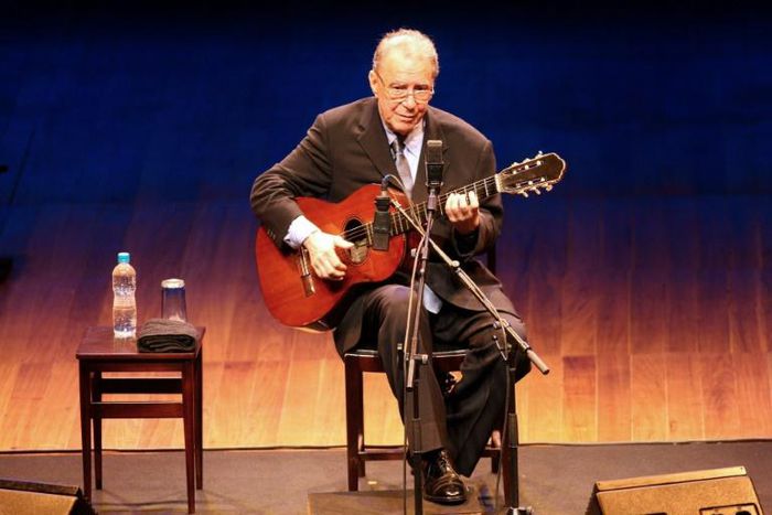 In this file photo taken on August 14, 2008, Brazilian singer and composer Joao Gilberto, a pioneer of bossa nova music, performs in Sao Paulo, Brazil; his son announced his death on July 6, 2019
