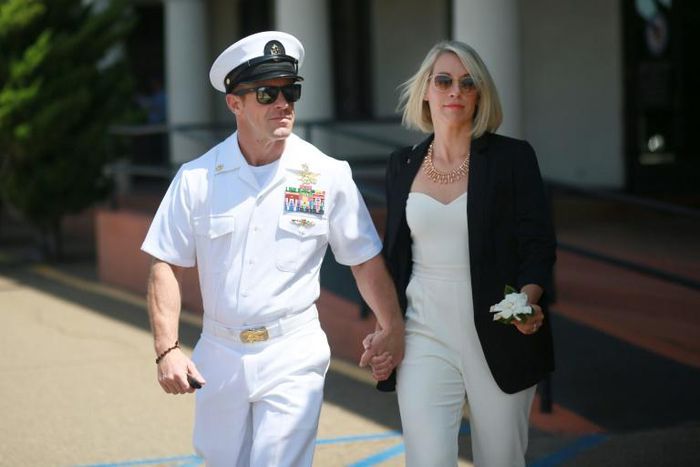 Navy Special Operations Chief Edward Gallagher walks out of military court with his wife Andrea as the jury deliberates in his war crimes trial, on July 2, 2019 in San Diego, California