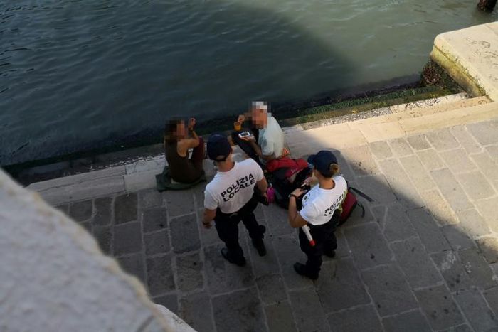Under a new law passed in Venice in May, people can be fined and asked to leave the city for inappropriate behaviour