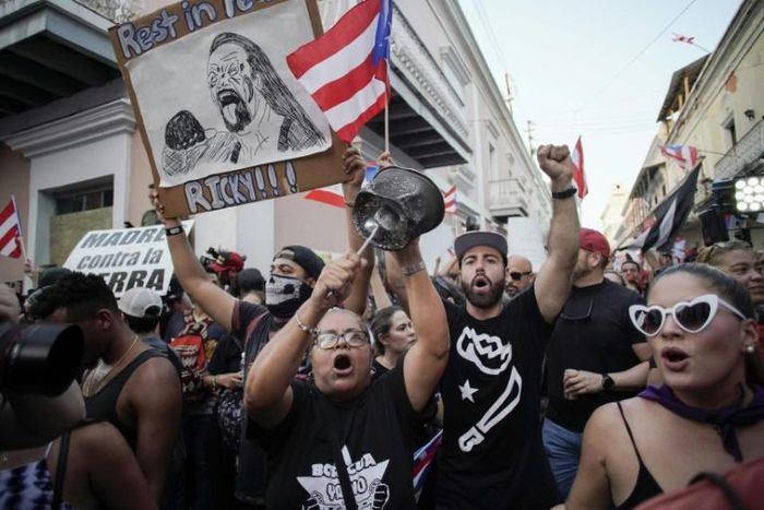 Demonstrators protest in front of the mansion of Puerto Rico's Governor, Ricardo Rossello, known as La Fortaleza, in San Juan, Puerto Rico, on July 24, 2019