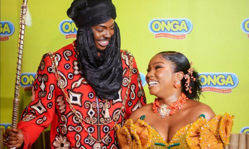 Enioluwa Adeoluwa and Bamike Olawunmi-Adenibuyan (Bambam), host, showing excitement at the Onga Village.