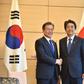 South Korea's President Moon Jae-in in happier times with Japan's Prime Minister Shinzo Abe