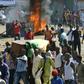 Violence erupted after hundreds marched in the capital Conakry to accompany coffins of people killed in more than a week of demonstrations
