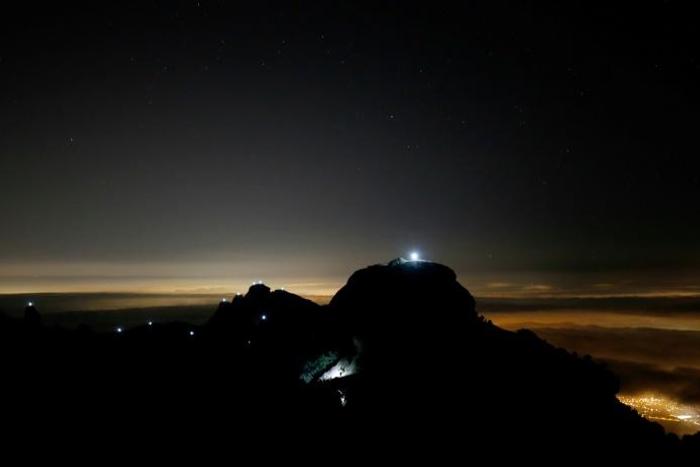 Catalan separatists joined a night-time operation to shine lights from 130 peaks in Catalonia to demonstrate their desire for independence