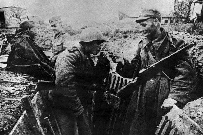 Picture taken in 1944 shows Polish and Soviet soldiers in ramparts on the front near Warsaw during World War II. Poland says it lost millions of lives and suffered much destruction and claims it is entitled to German reparations.