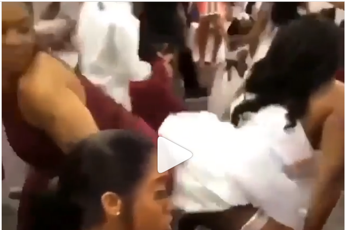 Overexcited bride displays her underwear in a crazy twerking at wedding reception