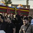 Mourners attend the funeral of five Syrian Democratic Forces fighters killed in battles against Turkey-led forces in the flashpoint town of Ras al-Ain