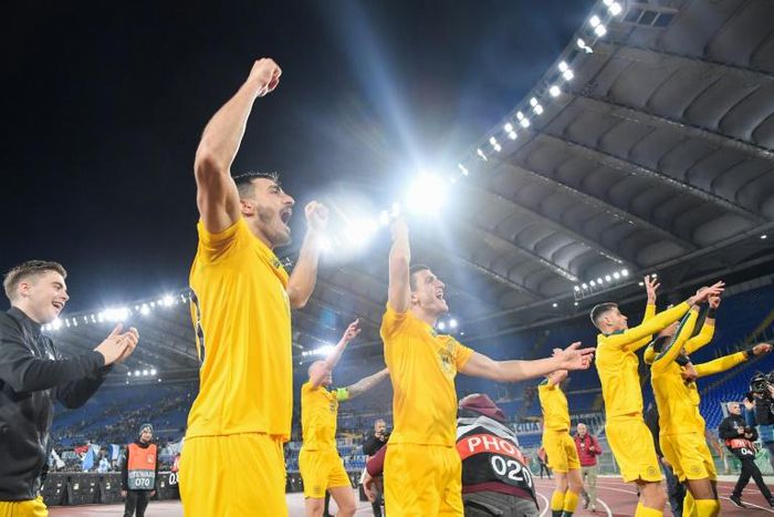 Roman conquerors: Celtic players celebrate a 2-1 win over Lazio in the Italian capital